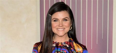 Tiffani Thiessen Poses in Just a Bed Sheet for 50th Birthday